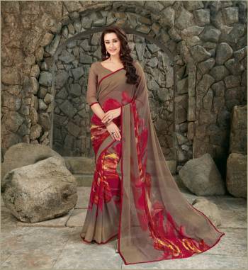 Add Some Casuals With This Saree In Brown Color Paired With Brown Colored Blouse. This Saree And Blouse Are Fabricated On Georgette Beautified With Prints. It Is Light In Weight And Easy To Carry All Day Long.