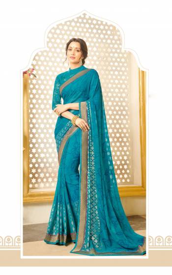 Simple and Elegant looking Saree IS Here In Turquoise Blue Color Paired With Turquoise Blue Colored Blouse. This Saree Is Fabricated On Georgette Paired With Net Fabricated Blouse. It Can Be Wear At Festive Or A Family Party.