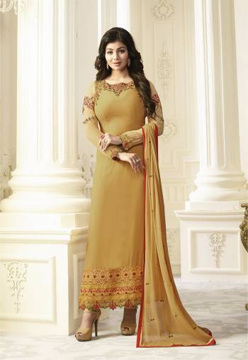 Simple and Elegant Looking Designer Straight Cut Suit Is Here In Beige Color Paired With Beige Colored Bottom And Dupatta. Its Top Is Fabricated On Georgette Paired With Santoon Bottom And Chiffon Dupatta. It Is Beautified with Multi Colored Embroidery. Buy Now.