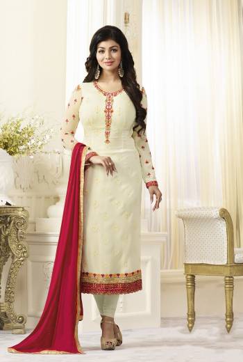 Look Pretty Wearing This Designer Straight Cut Suit In White Color Paired With Dark Pink Colored Dupatta. Its Top Is Fabricated On Georgette Paired With Santoon Bottom And Chiffon Dupatta. This Pretty Suit Is Beautified With Multi Colored Embroidery. Buy It Soon.