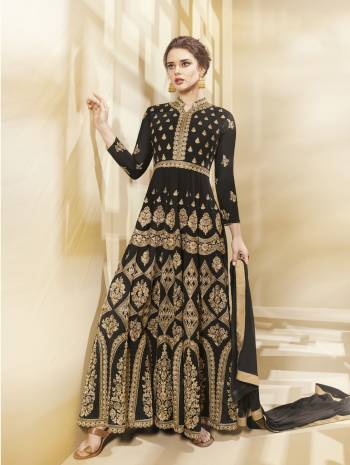 For A Bold And Beautiful look, Grab This Beautiful Designer Floor Length Suit In Black Color Paired With Black Colored Bottom And Dupatta. Its Top Is Fabricated On Georgette Paired With Santoon Bottom And Chiffon Dupatta. Buy This Lovely Suit Now.