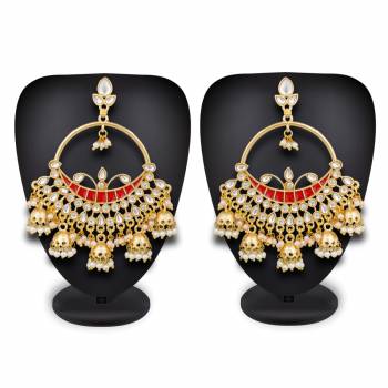 Grab This Beautiful Traditonal Heavy Earrings In Golden and Red Color Beautified With Stone And Moti Work. These Pair Of Beautiful Earrings Can Be Paired With Orange Or Any Contrasting Colored Ethnic Attire.