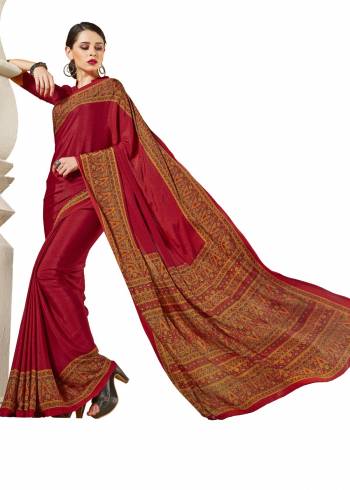 For A Royal Look, Grab This Pretty Saree In Maroon Color Paired With Maroon Colored Blouse. This Saree And Blouse Are Fabricated On Crepe Beautified With Prints all Over It.