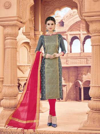 You Will Definitely Earn Lots Of Compliments Wearing This Straight Cut Suit In Grey Colored Top Paired With Dark Pink Colored Bottom And Dupatta. Its Top Is Fabricated On Banarasi Art Silk Paired With Cotton Bottom And Khadi Silk Dupatta. Buy This Dress Material Now.