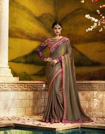 New And Unique Shade Is Here With This Designer Saree In Light Brown Color Paired With Contrasting Purple Colored Blouse. This Saree Is Fabricated On Silk Georgette Paired With Art Silk And Georgette Fabricated Blouse. Buy This Saree Now.