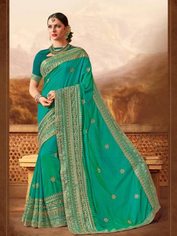 Drape this Blue color two tone silk fabrics saree. this gorgeous saree featuring a beautiful mix of designs. look gorgeous at an upcoming any occasion wearing the saree. Its attractive color and designer heavy embroidered design, Flower patch design, beautiful floral design work over the attire & contrast hemline adds to the look. Comes along with a contrast unstitched blouse.