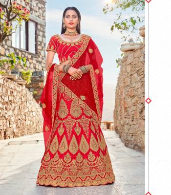 Adorn the Pretty Angelic Look Wearing This Heavy Designer Lehenga Choli In Red Color Paired With Red Colored Dupatta. Its Blouse And Lehenga Are Fabricated On Satin Silk Paired With Net Fabricated Dupatta. It Is Beautified With Heavy Jari Embroidery And Stone Work. Buy This Lehenga Choli Now.