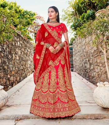 Get Ready The Day With This Heavy Designer Lehenga Choli In Red Color Paired With Colored Dupatta. This Designer Lehenga Choli Has Heavy Jari Embroidery With Stone Work. Its Blouse And Lehenga Are Fabricated On Art Silk Paired With Net Fabricated Dupatta. Buy This Soon Before The Stock Ends.