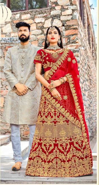 Adorn The Beautiful Angelic Look Wearing This Designer Lehenga choli In Red Color Paired With Red Colored Dupatta. Its Blouse And Lehenga Are Fabricated On Velvet Paired With Net Fabricated Dupatta. This Lehenga Choli Is Beautified With Heavy Jari And Thread Work All Over It. Buy This Now And You Will Definitely Earn Lots Of Compliments Wsaring This Lehenga Choli.