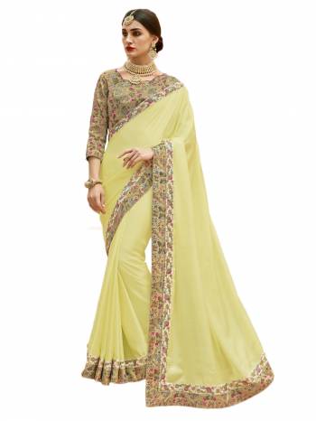 Celebrate This Festive Season Wearing This Designer Saree In Light Yellow Color Paired With Beige Colored Blouse. This Saree Is Fabricated On Satin Silk Paired With Art Silk Fabricated Blouse. Buy This Simple And Elegant Looking Saree In Pretty Color Now.