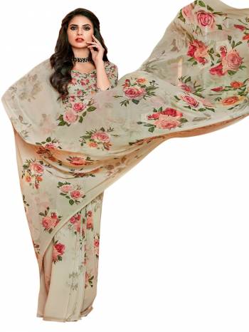 Flaunt Your Rich And Elegant Taste Wearing This Saree In Beige Color Paired With Beige Colored Blouse. This Saree And Blouse Are Fabricated On Georgette Beautified With Bold Floral Prints All Over.