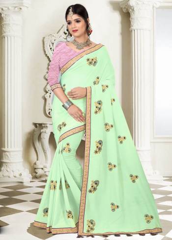 This Season Is About Subtle Shades And Pastel Play, Grab this Designer Saree In Pastel Green Color Paired With Contrasting Light Pink Colored Blouse. This Saree Is Fabricated On Silk Paired With Art Silk Fabricated Blouse. This Saree Is Beautified With Embroidered Motifs All Over. Buy This Pretty Saree Now.