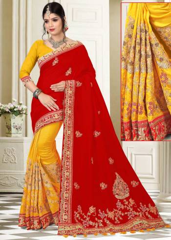 Celebrate This Festive Season Wearing This Designer Saree In Red And Yellow Color Paired With Yellow Colored Blouse. This Saree Is Fabricated On Silk Paired With Art Silk Fabricated Blouse. It Is Beautified With Heavy Jari And Thread Embroidery.