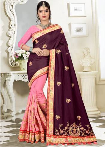 For The Designer Pieces, Grab This Beautiful Designer Saree In Purple And Pink Color Paired With Pink Colored Blouse. This Saree Is Fabricated On Silk Paired With Art Silk Fabricated Blouse. It Has Heavy Jari And Thread Embroidery Which Gives And Attractive Look To The Saree.