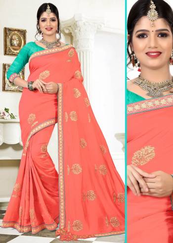 A Must Have Shade In Every Womens Wardrone Is Here, Grab This Designer Saree In Dark Peach Color Paired With Contrasting Turquoise Blue Colored Blouse. This saree Is Fabricated On Silk Paired With art Silk Fabricated Blouse. Buy This Saree Now.