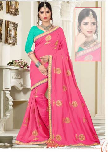 Shine Bright Wearing This Designer Saree In Rani Pink Color Paired With Contrasting Turquoise Blue Colored Blouse. This Saree Is Fabricated On Silk Paired With Art Silk Fabricated Blouse. Buy This Designer Saree Now.