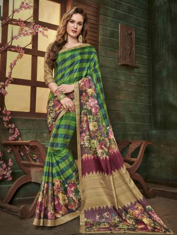 Be It Your Semi-Casual Wear Or Social Gatherings, This Saree Is Suitable For All. Grab This Pretty Saree In Green and Multi Color Paired With Contrasting Beige Colored Blouse, This Saree And Blouse are Fabricated On Cotton Silk Beautified with Prints All Over It.