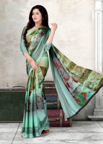 Lovely Shade In Blue Is Here With This Pretty Saree In Aqua Blue Color Paired With Aqua Blue Colored Blouse. This Saree And Blouse Are Fabricated On Chiffon Which Ensures Superb Comfort All Day Long.