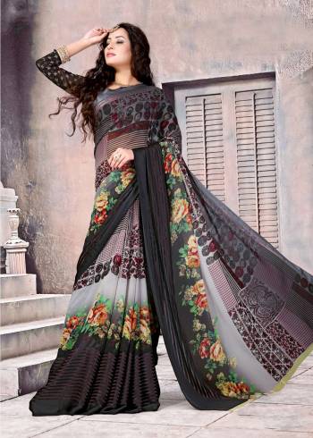 For a Bold And Beautiful Look, Grab This Saree In Black Color Paired With Black Colored Blouse. This Saree And Blouse Are Fabricated On Satin Silk Beautified With Multiple Prints All Over It.