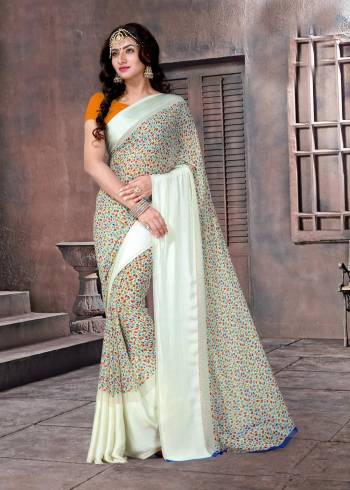 Lightest Shade In Blue Is Here With This Pretty Saree In Baby Blue Color Paired With Contrasting Orange Colored Blouse. This Pretty Saree And Blouse are Fabricated On Satin Silk Beautified With Intricate Floral Prints All Over The Saree. Buy It Now.