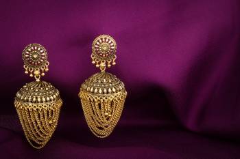 New And Unique Patterned Jhumkas Styled Earrings Are Here In Golden Color. This Beautiful Pair Is Light Weight And Can Be Paired With Any Colored Ethnic Attire.