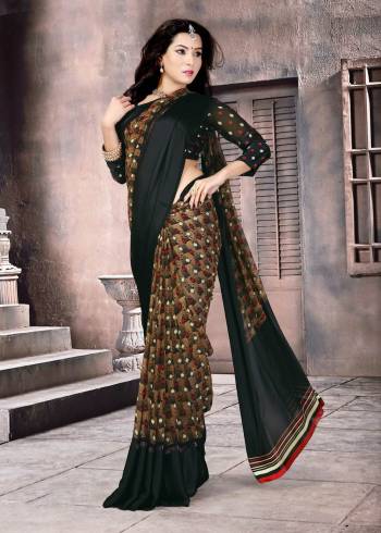 Look Bold And Enhance Your Beauty Wearing This Saree In Brown And Black Color Paired With Black Colored Blouse. This Saree And Blouse Are Fabricated On Satin Silk Beautified With Prints Intricate Prints All Over.