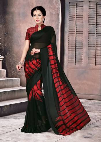 Evergreen Combination Is Here With This Saree In Black And Red Color Paired With Red Colored Blouse. This Saree And Blouse Are Fabricated On Satin Silk Beautified With Prints Over The Broad Border.