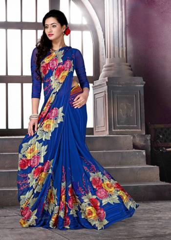 Bright And Visually Appealing Color Is Here With This Saree In Royal Blue Color Paired With Royal Blue Colored Blouse. This Saree And Blouse Are Fabricated On Satin Silk Beautified With Bold Floral Prints. Buy This Saree Now.