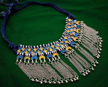 For The Upcoming Festive Season, Grab This Beautiful Necklace In Silver Color Highlited With Blue Colored Threads. This Necklace Is Light Weight And easy To Carry Throughout The Gala.