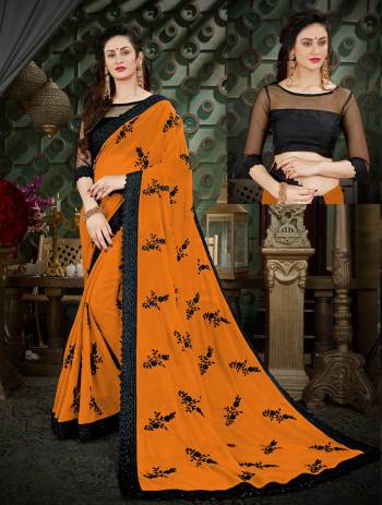 Celebrate This Festive Season Wearing This Saree In Musturd Yellow Color Paired With Black Colored Blouse. This Saree Is Fabricated On Georgette Paired With Art Silk Fabricated Blouse. Buy This Pretty Saree Now.