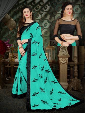 Add This Lovely Shade In Green To Your Wardrobe With This Saree In Sea Green Color Paired With Black Colored Blouse. This Saree Is Fabricated On Georgette Paired With Art Silk Fabricated Blouse. It Is Light Weight, Durable And Easy To care For.