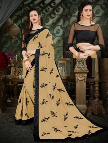 Flaunt Your Rich And Elegant Taste Wearing This Saree In Beige Color Paired With Black Colored Blouse. This Saree Is Fabricated On Georgette Paired With Art Silk Fabricated Blouse. Its Fabric Ensures Superb Comfort All Day Long.