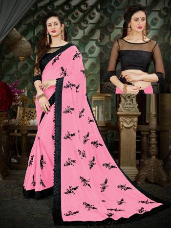 You Will Definitely Earn Lots Of Compliments Wearing This Pretty Saree In Baby Pink Color Paired With Black Colored Blouse. This Saree Is Fabricated On Georgette Paired With Art Silk Fabricated Blouse. Buy This Saree Now.