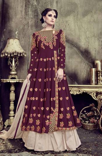 Add This New Shade To Your Wardrobe With This Designer Indo-Western Suit In Wine Colored Top Paired With Pale Grey Colored Bottom And Dupatta. Its Top Is Fabricated On Georgette Paired With Art Silk Bottom And Chiffon Dupatta. All Its Fabric Ensures Superb Comfort All Day Long. Buy This Designer Suit Now.
