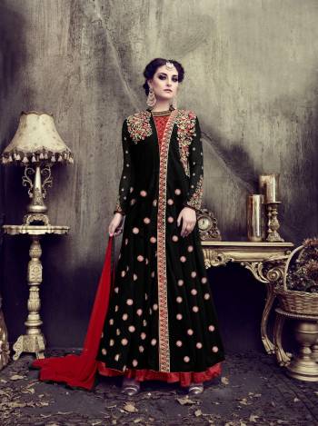 For A Bold And Beautiful Look, Grab This Designer Indo-Western Suit In Black Colored Top Paired With Red Colored Bottom And Dupatta. Its Top Is Fabricated On Georgette Paired With Art Silk Bottom And Chiffon Dupatta. Buy This Designer Suit Now.