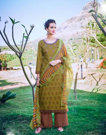 Add This New Shade Shade In Green With This Dress Material In Green Colored Top Paired With Multi Colored Bottom And Dupatta. Its Top and Bottom Are Fabricated On Cotton Paired With Chiffon Dupatta. It Is Light In Weight And Easy To Carry All Day Long.