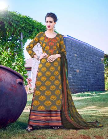 For A Bold And Beautiful Look, Grab This Dress Material In Grey Color Paired With Multi Colored Bottom And Dupatta. Its Top And Bottom Are Fabricated On Cotton Paired With Chiffon Dupatta. Get This Stitched As Plazzo For Utmost Comfort. 