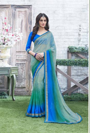 Look Pretty Wearing This Saree In Light Blue Color Paired With Royal Blue Colored Blouse. This Saree And Blouse Are Fabricated On Georgette Beautified With Prints All Over The Saree. Buy This Regular Wear Saree Now.