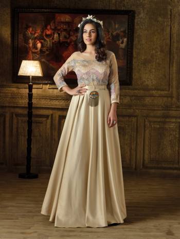 Flaunt Your Rich And Elegant Taste Wearing This Designer Floor Length Gown In Cream Color Made With Imported Fabrics Which Is Soft Towards Skin And Easy Care For.