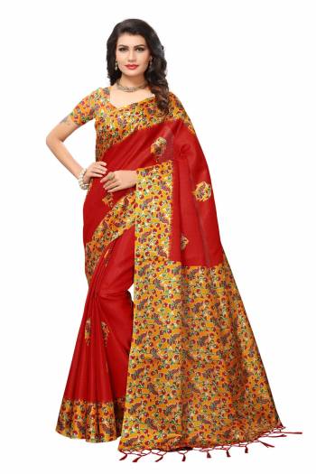 Adorn The Angelic Look Wearing This Saree In Red Color Paired With Contrasting Yellow Colored Blouse. This Saree And Blouse Are Fabricated On Kashmiri Art Silk Beautified With Multi Colored Floral Prints All Over.