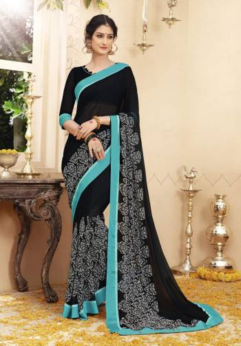 Bold And Beautiful Look Is Here with This Saree In Black Color Paired With Maroon Colored Blouse. This Saree And Blouse Are Fabricated On Georgette Beautified With Prints And Contrasting Lace Border. Buy This Saree Now.