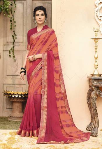 A Must Have Shade In Every Womens Wardrobe Is Here With This Saree In Peach And Pink Color Paired With Dark Pink Colored Blouse. This Saree And Blouse Are Fabricated On Georgette Beautified with Prints And Lace Border. 