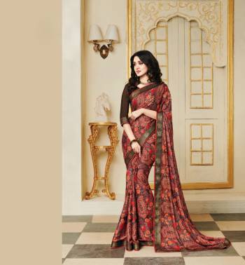 Go Colorful With This Saree In Multi Color Paired With Brown Colored Blouse. This Saree Is Fabricated On Silk Georgette Paired With Art Silk Fabricated Blouse. It Is Beautified With Prints All Over. 