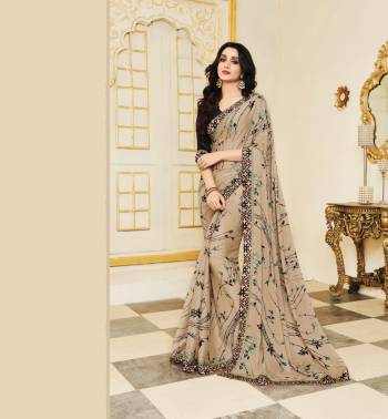 You Will Definitely Earn Lots Compliments Wearing This Saree Cream Color Paired With Black Colored Blouse. This Saree Is Fabricated On Silk Georgette Paired With Paired With Art Silk Fabricated Blouse. It Has Simple Prints All Over.