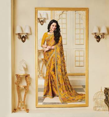 Celebrate Ths Festive Season Wearing This Saree In Yellow Color Paired With Yellow Colored Blouse. This Saree Is Fabricated On Silk Georgette Paired With Art Silk Fabricated Blouse. It Is Light Weight And Easy To Carry All Day Long.