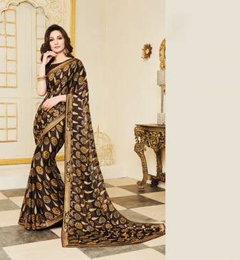 Enhance Your Beauty Wearing This Saree In Brown Color Paired With Brown Colored Blouse, This Saree Is Fabricated On Silk Georgette Paired With Art Silk Fabricated Blouse. This Saree Ensures Superb Comfort All Day Long.