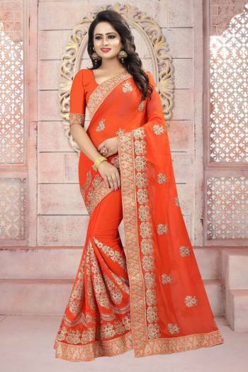 Orange Color Induces Perfect Summeru Appeal To Any Outift, So Grab This Saree In Orange Color Paired With Orange Colored Blouse. This Saree And Blouse Are Fabricated On Georgette Beautified With Jari Embroidery .