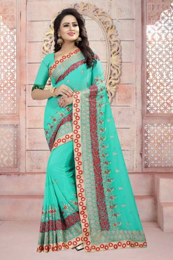 Add This Pretty Saree To Your Wardrobe In Sea Green Color Paired With Sea Green Colored Blouse, This Saree And Blouse Are Fabricated On Georgette Beautified With Resham And Jari Embroidery. Buy This Heavy Saree Now.