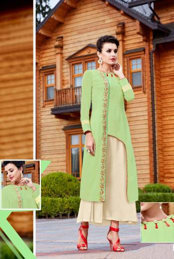 Add This Pretty Readymade Designer Kurti To Your Wardrobe In Light Green And Beige Color Fabricated On Georgette. This Kurti Is Light Weight And Easy To Carry All Day Long.