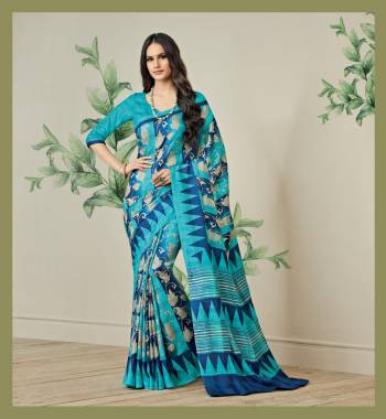 Add This Saree For Your Casual Wear In Blue Color Paired With Blue Colored Blouse, This Saree IS Fabricated On Jute Art Silk Paired With Art Silk Fabricated Blouse. It Is Light Weight And Easy To Drape. Buy This Saree Now.